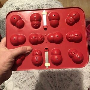 Red Nordic ware 12 snowman cake pop baking mold, like new- fun project for kids.